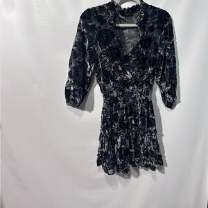 SOLD ).    Black Fit and Flare Dress with 3/4 Cuffed Sleeves